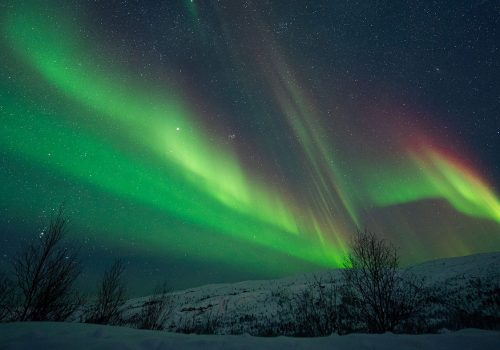 Chasing Northern Lights by snowshoes- Hendrik Seifert - kirkenes tours 1