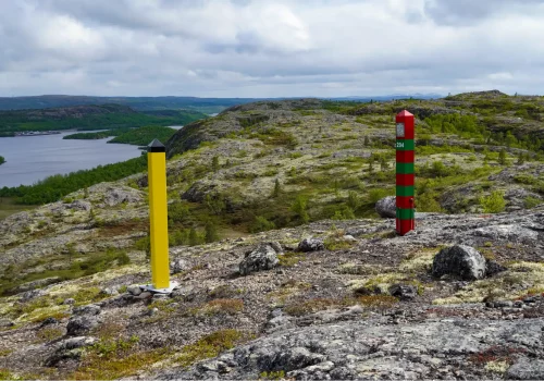 View on border markers of Norwegian Russian border near Kirkenes in Northern Norway